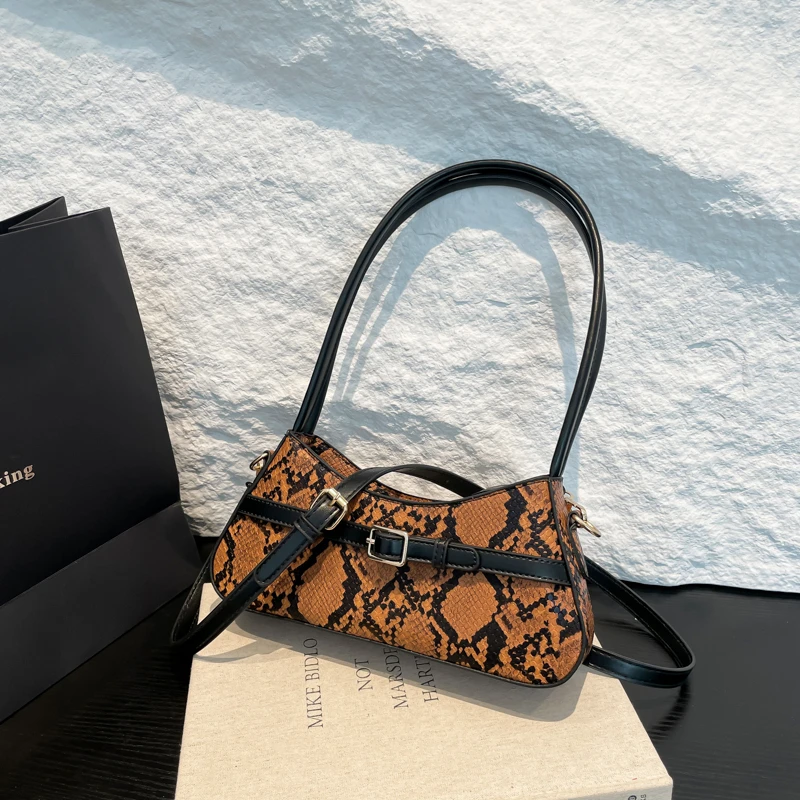 

2025 Spring New Hot Sale Serpentine PU Shoulder and Crossbody Bags High Quality Personality Hot Trendy Armpit Bags for Women