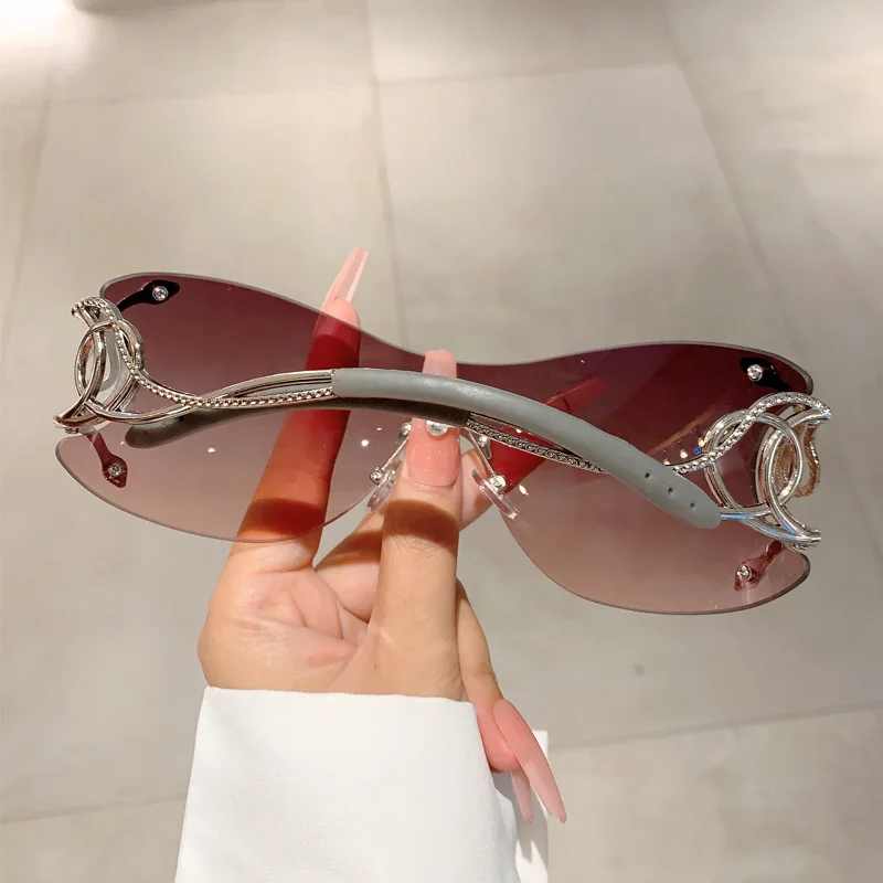 Y2K Rimless Luxury Brand Designer Sunglasses Women For Men One Piece Trendy Oversized Sun Glasses Metal Snake Pink Punk Shades
