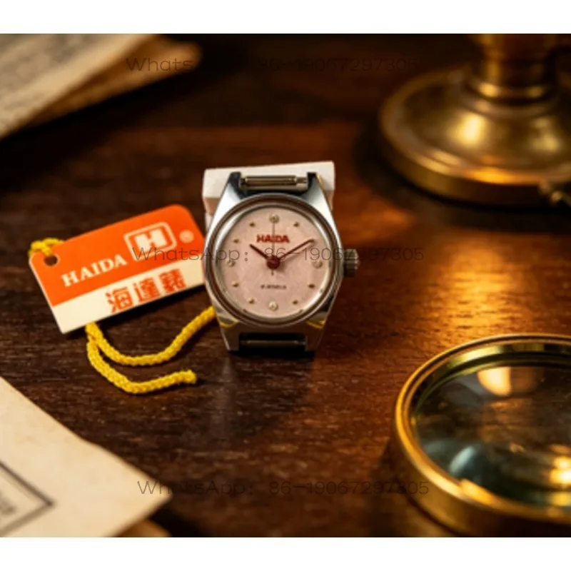 

[Guangguang Shop] Shanghai Haida brand 17-diamond hand-wound machinery, white shell and white surface, women's watch