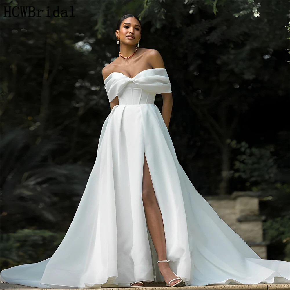 

Custom Made 2025 White Long African Wedding Dress Off The Shoulder A Line High Split Organza Bride Wedding Party Gowns Wholesale