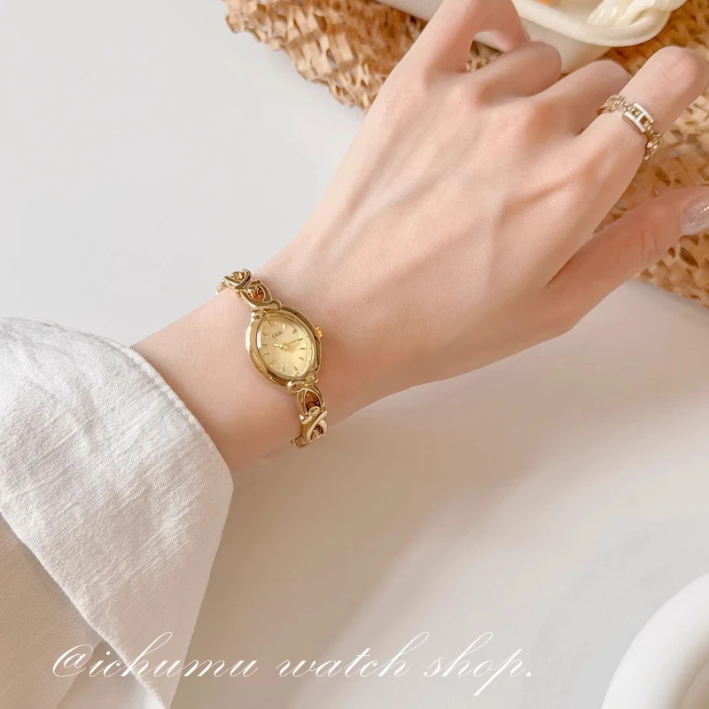 2025 Exquisite Gold Bracelet Women's Quartz Watch Creative Clock Waterproof Steel Belt Fashion Women's Watch Luxury