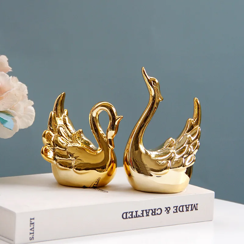 

Nordic Ceramic Golden Mini Swan Pair of Figurines Couple Statue Cute Home Decoration Living Room Table Ornaments Wedding Gift