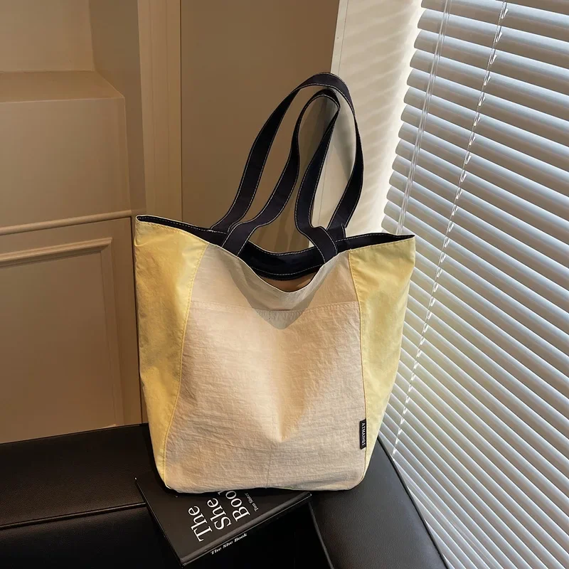 Japanese niche design casual cloth bag 2026 spring trend western-style personalized large capacity storage bag