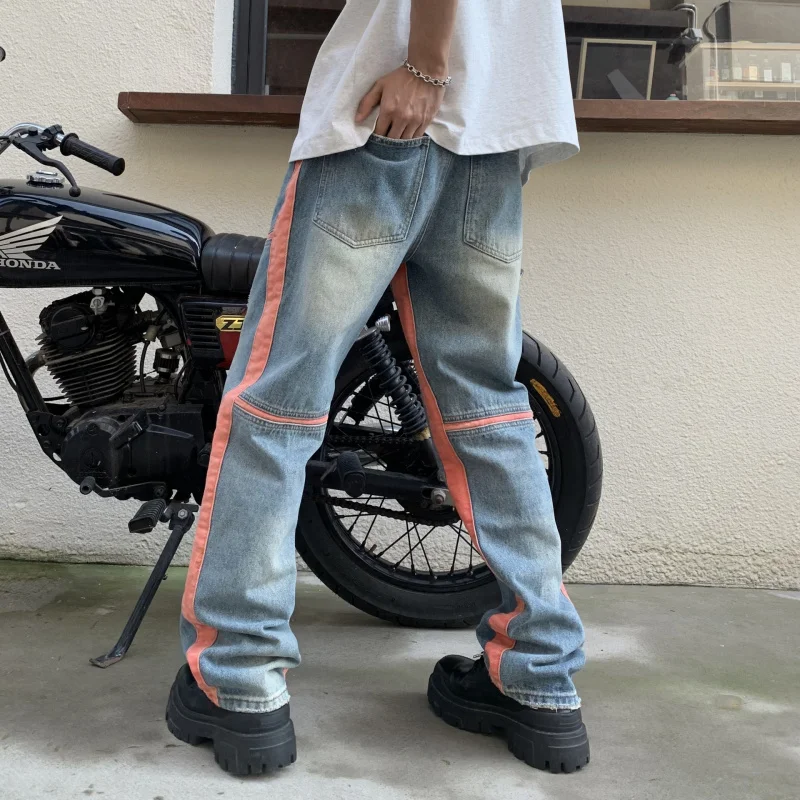 ออกแบบเสื้อผ้าผู้ชายอเมริกันตรงกางเกงยีนส์ผู้ชายหลวมบุคลิกภาพ Splicing Retro แฟชั่น Casual ล้างกางเกงผู้ชาย