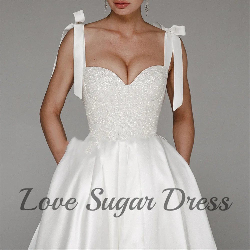 Wykwintne suknie ślubne Sweetheart Eleganckie długie suknie ślubne A Line Sparkly Satin Back Lace Up Bride Dress vestidos de novia