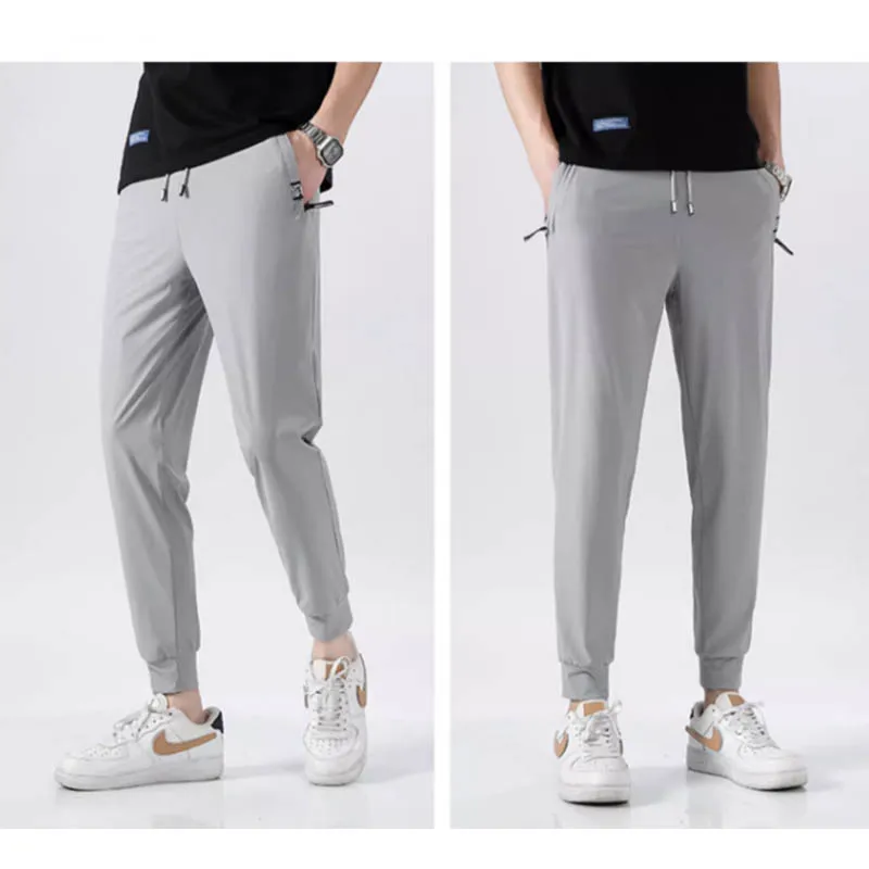 

Autumn plus-size casual pants men slim slim feet constraint fashion thin brand pocket zipper men's pants