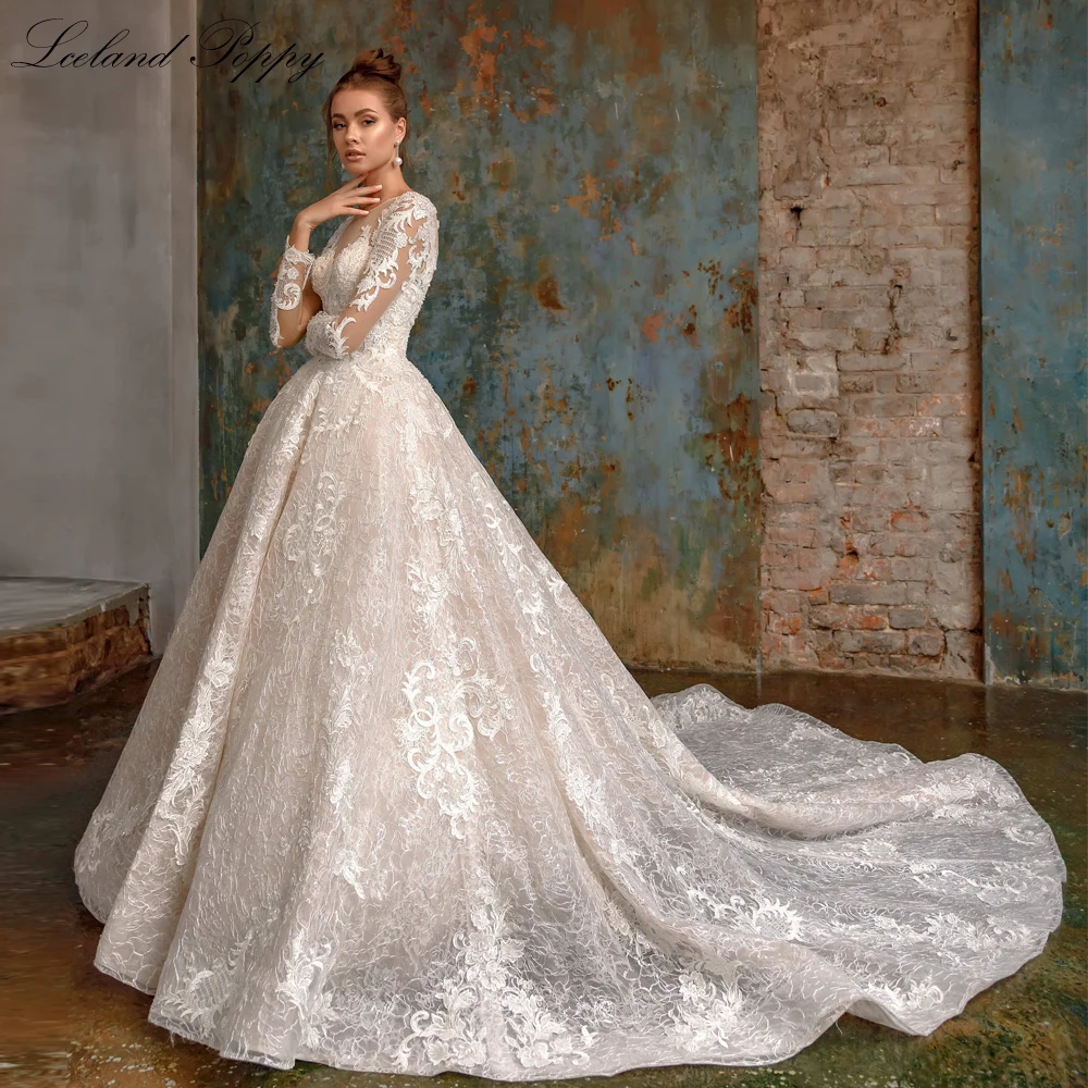 

Lceland Poppy Glamorous Scoop Neck A Line Lace Wedding Dresses Full Sleeves Beaded Bridal Gowns with Cathedral Train