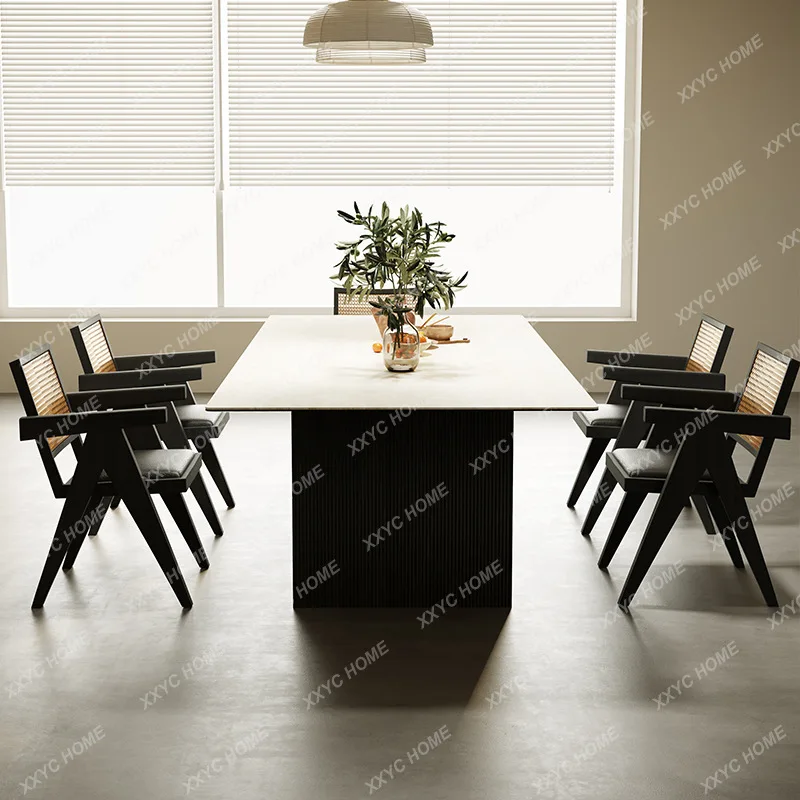 Retro walnut dining table and chair combination imported travertine rock slab oval minimalist large apartment