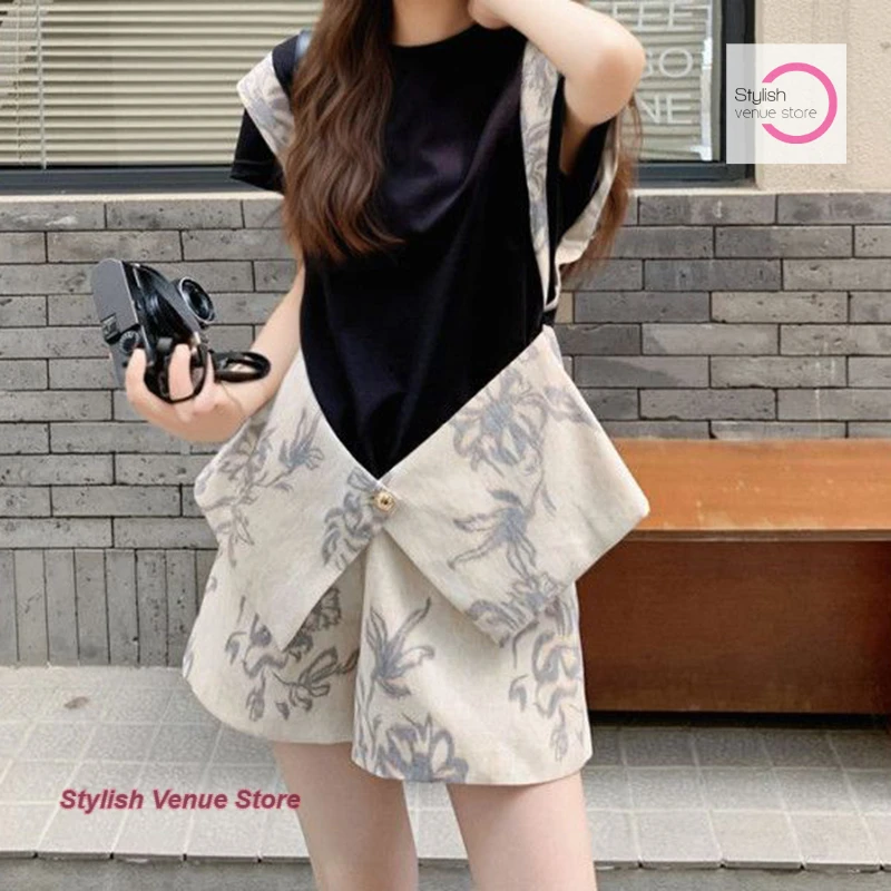 

Korean luxury design suit female summer new waist slimming fake two-piece short-sleeved T-shirt printed shorts two-piece suit