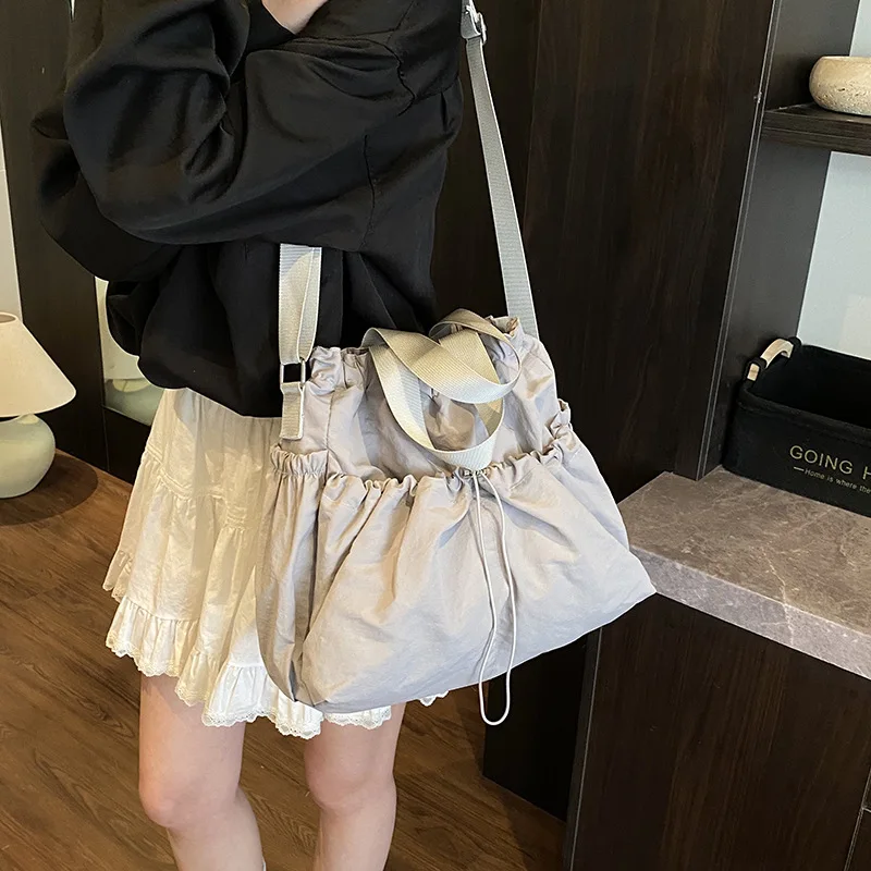 2025 New Nylon Drawstring Backpack for Women, Spacious Travel Rucksack, Water-Resistant Gym Bag, Versatile & Lightweight​