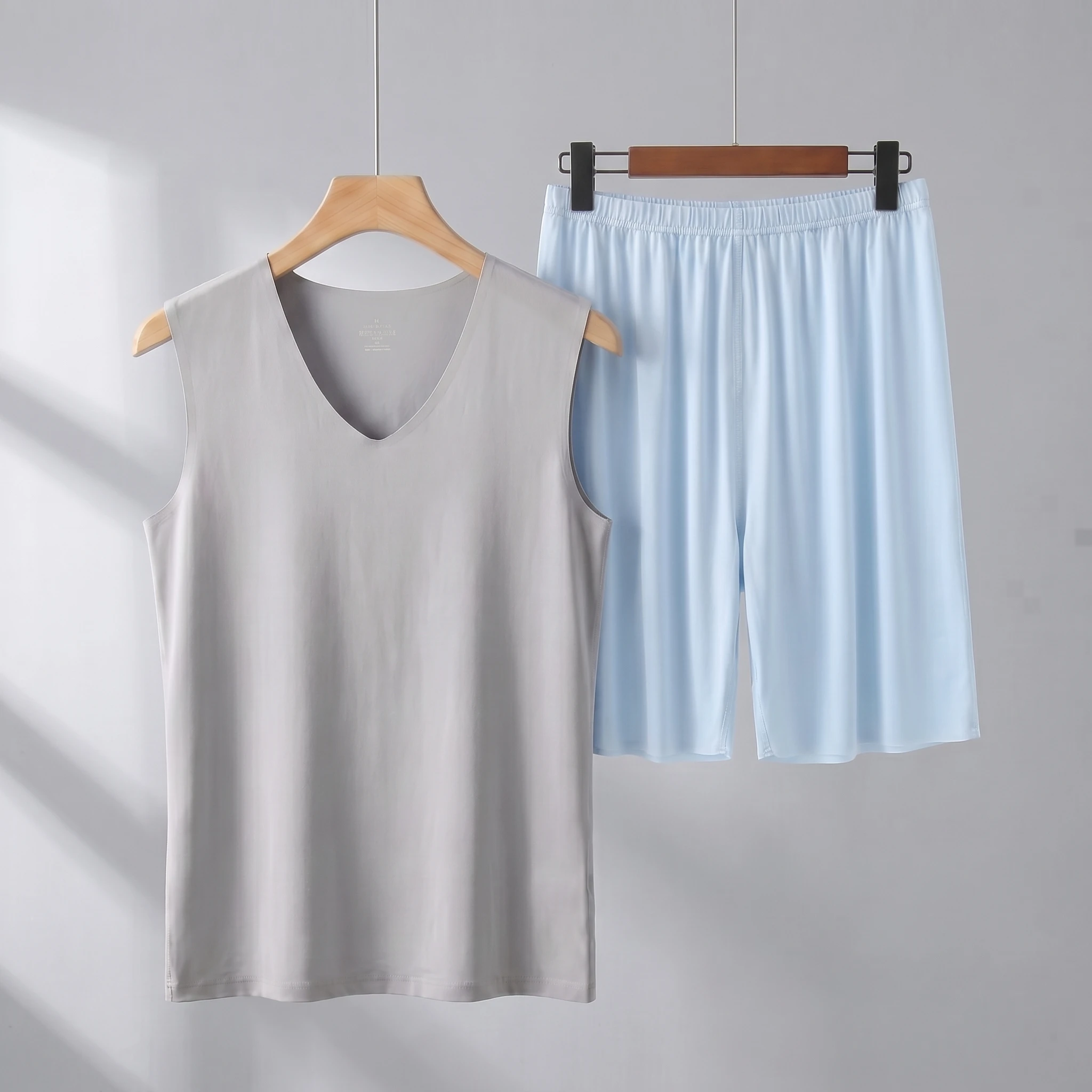 Gray vest + light blue shorts