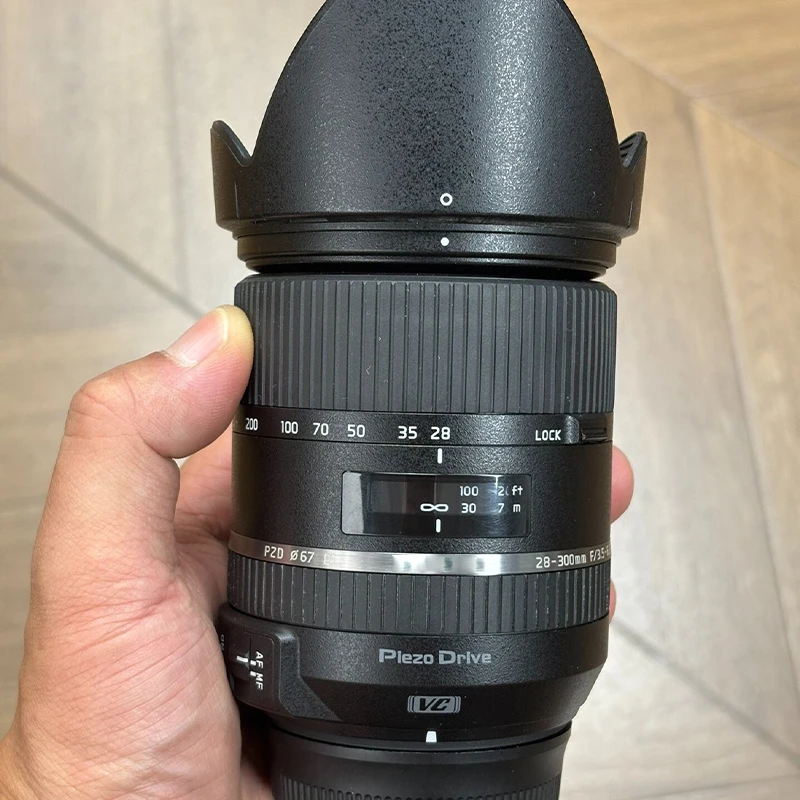 Lente con Zoom Tamron 28-300mm F/3.5-6.3 Di VC PZD (97% Nueva) para Cámaras Canon EF y Nikon
