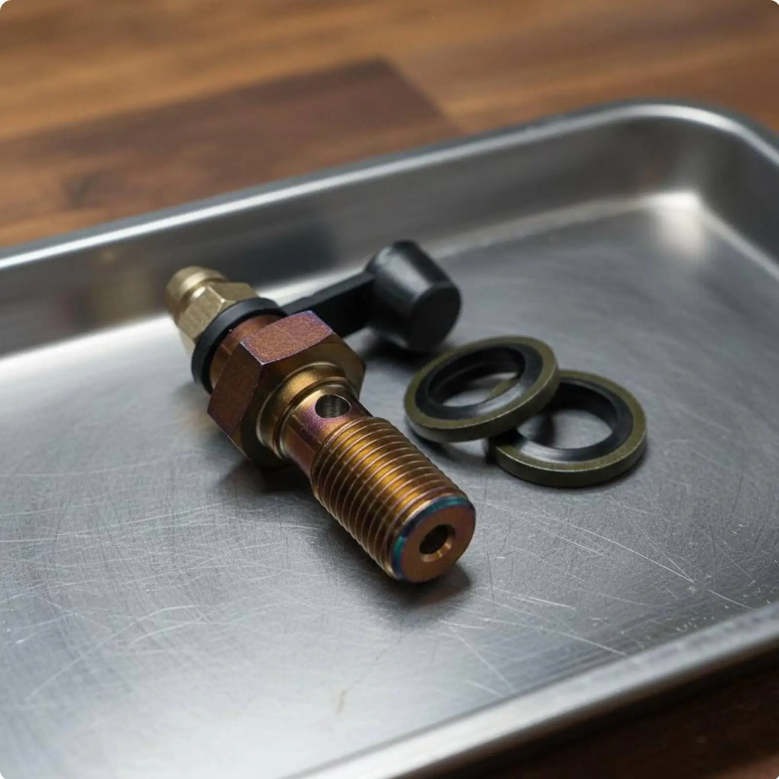Motorcycle Hydraulic Brake Caliper Bleed Valve Screw with Copper Washers for Secure Leak Tight Brake System Repair