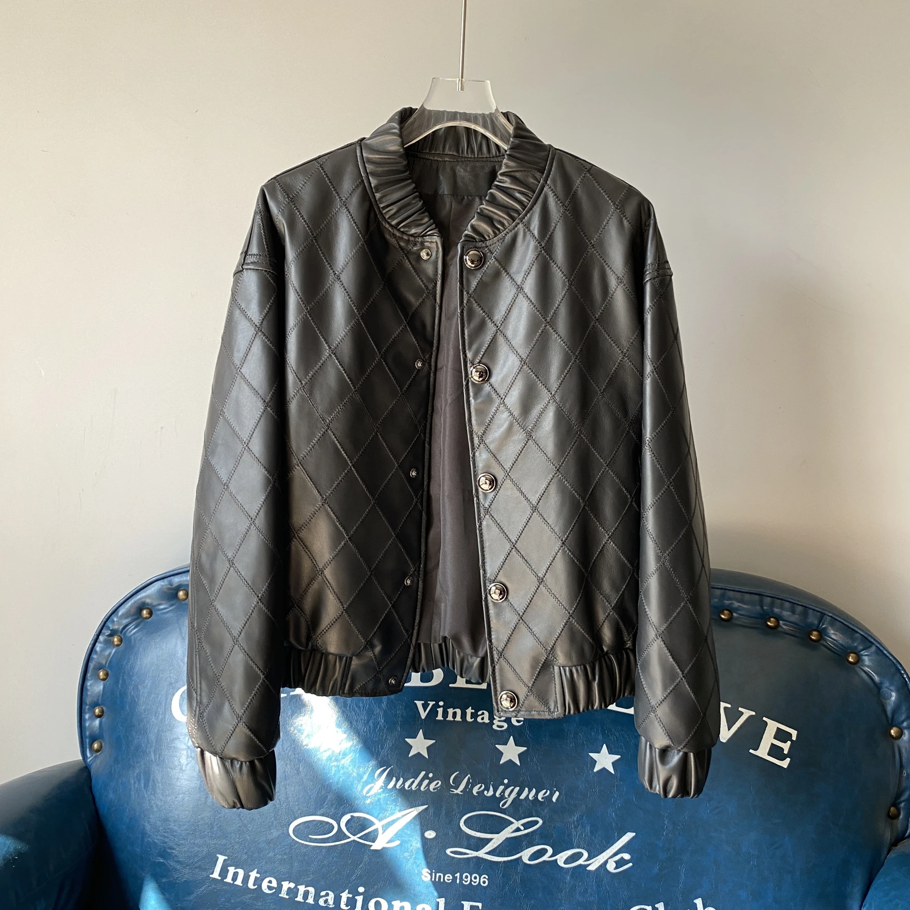 カジュアルレザーバイカージャケット レディース シープスキン 本革 ブラック ラウンドネック ロングスリーブコート 春秋新作