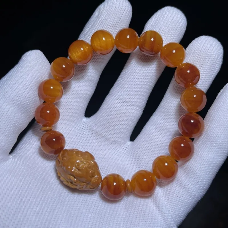 Fully translucent amber wood bracelet with a patina finish, solidified Northern agarwood Buddhist beads, rich in oil, made from