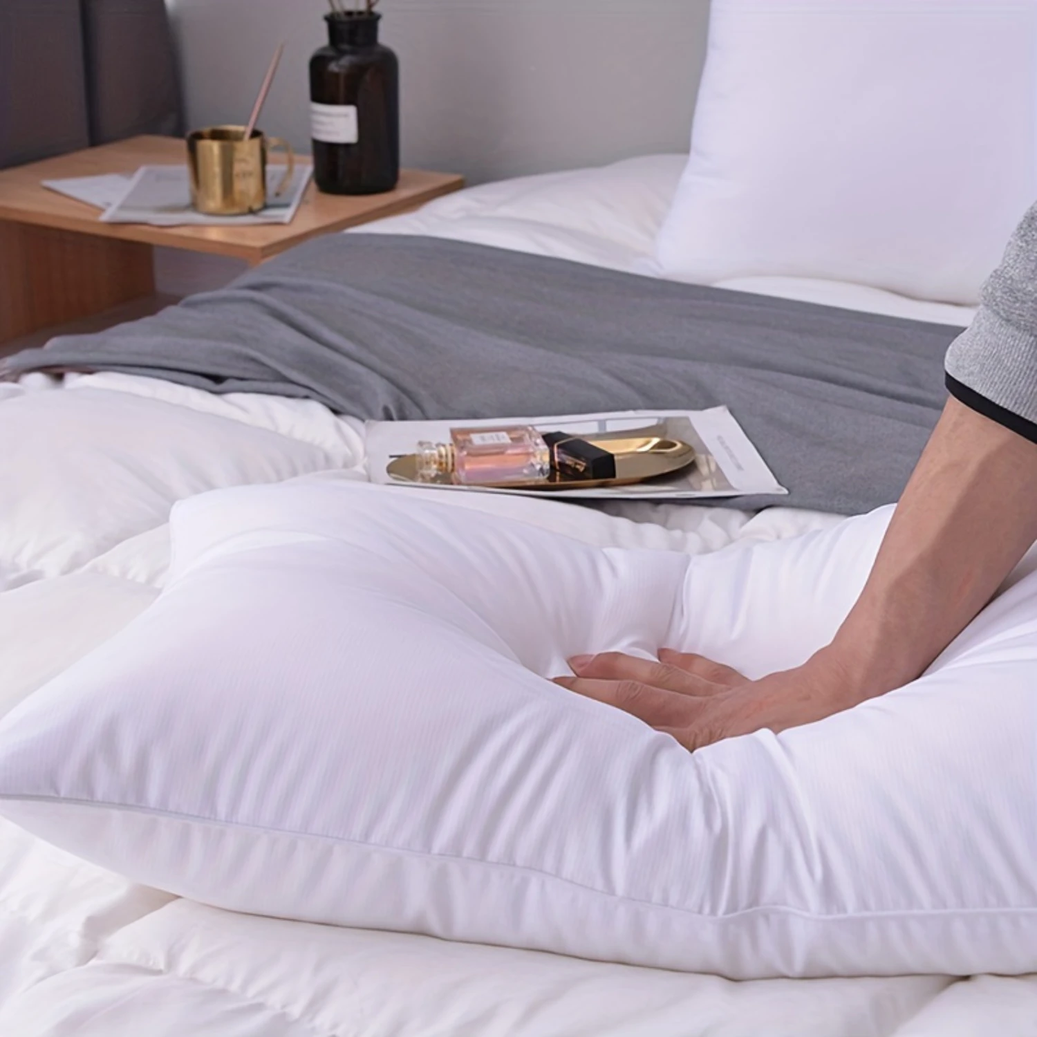 leep Quality with this Plush White Hotel Bed Pillow featuring a Soft, Hypoallergenic Fill. Indulge in the Superior Comfort of th