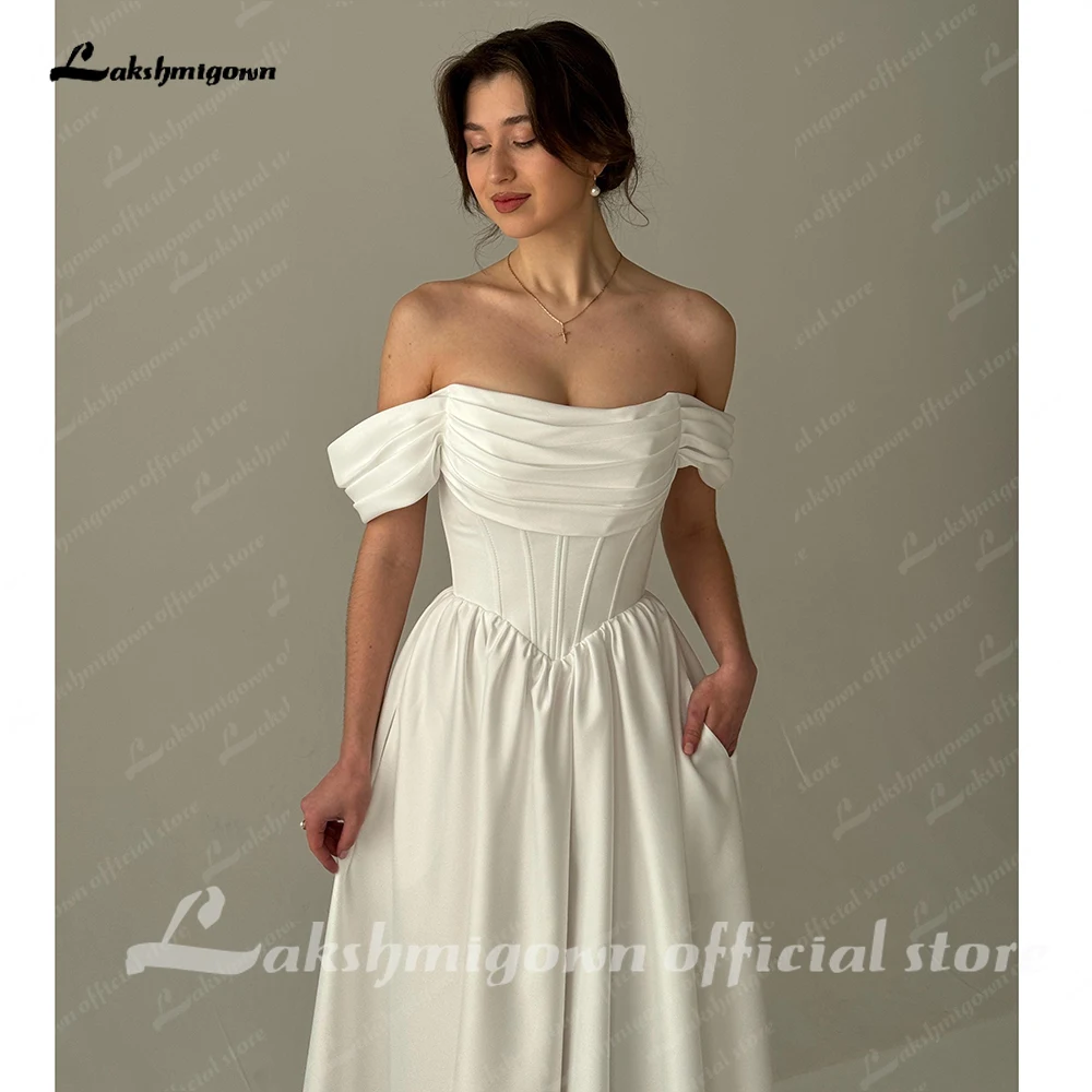 Lakshmigown Schulterfreies, plissiertes, herzförmiges, dickes Satin-Brautkleid in A-Linie mit V-förmiger Taille, maßgeschneidert. – Detail 7