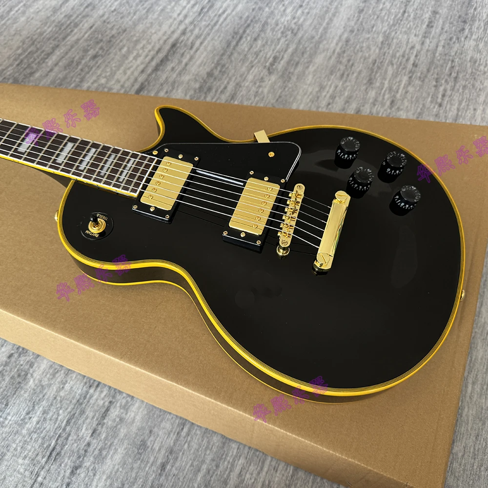 High quality black LP custom electric guitar,rosewood fingerboard,yellow edges,in stock