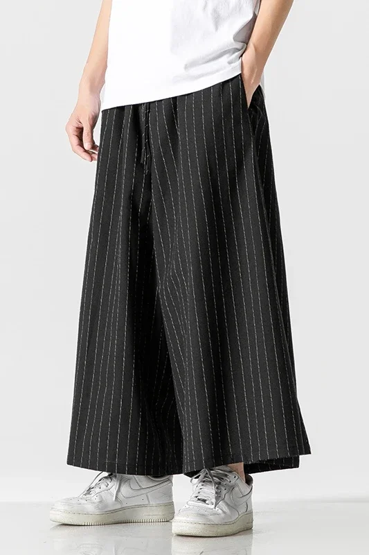 الرجال الكورية الأزياء بنطال ذو قصة أرجل واسعة 2025 رجل أسود فضفاض عادية سراويلي حريمي اليابانية الشارع الشهير ركض مخطط السراويل الرجعية 5Xl