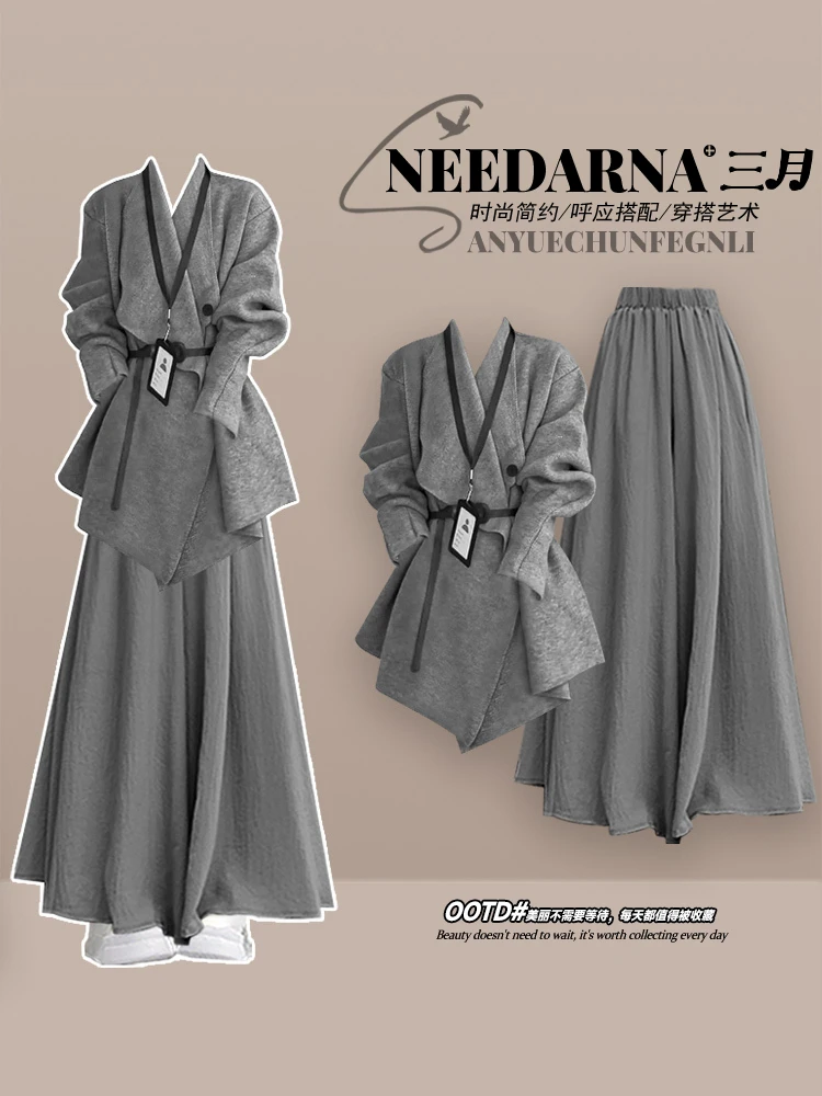 طقم نسائي عصري وغير رسمي للربيع والخريف النسخة الكورية سترة محبوكة + تنورة رمادية طقم نسائي أنيق مكون من قطعتين