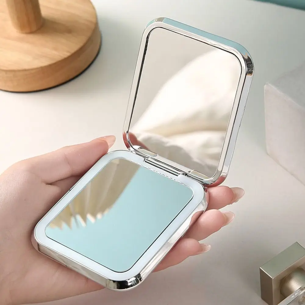 Geschenk Doppelseitiger LED-Schminkspiegel mit Beschichtung, dimmbarer Taschenspiegel mit Licht, handgehaltener INS-Reise-Kosmetikspiegel, Schlafzimmer