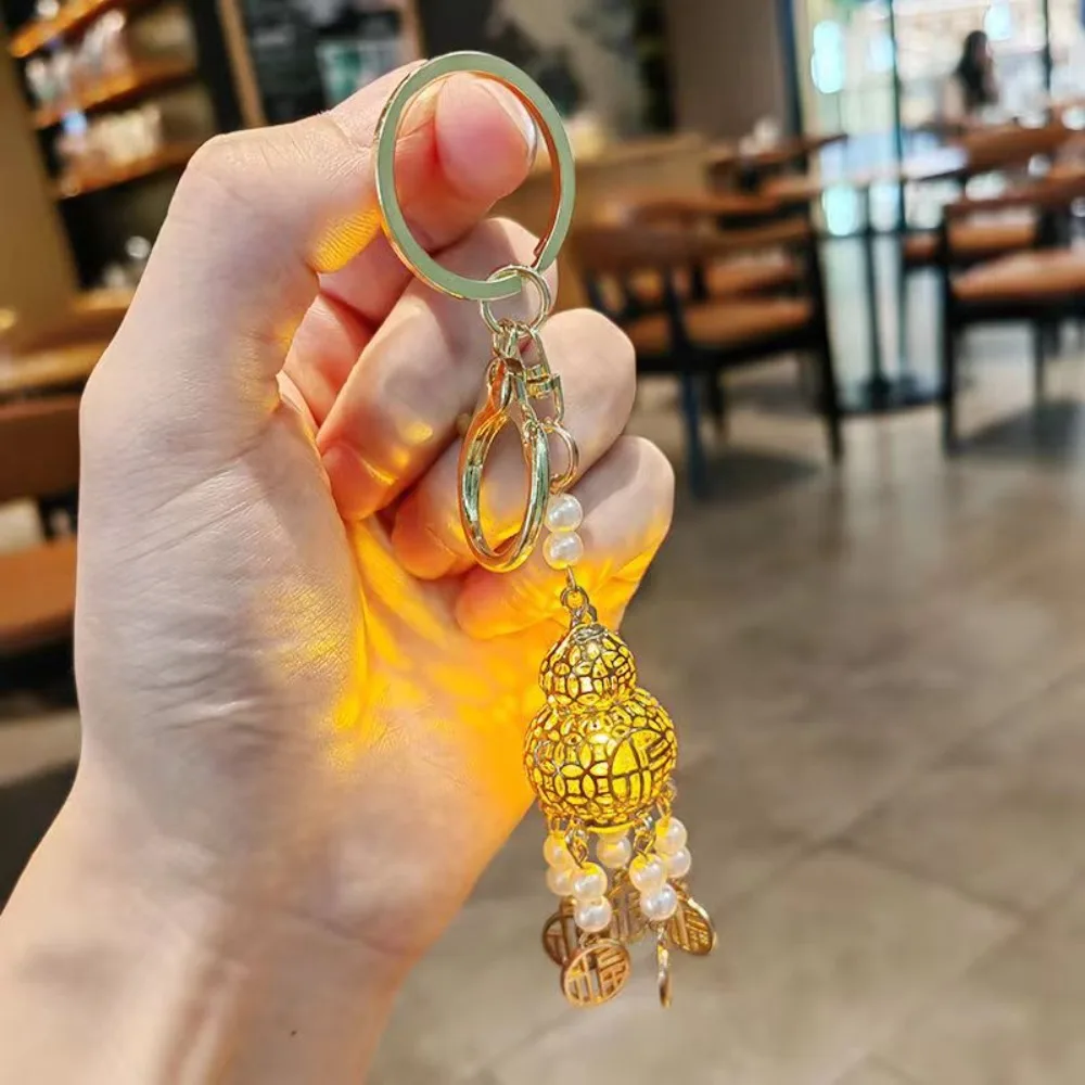 Luminous Luminous Lamp Key Chain Pull-back Car Trinket Gourd-shaped Key Chain Creative Durable Pavilion Lamp Key Chain