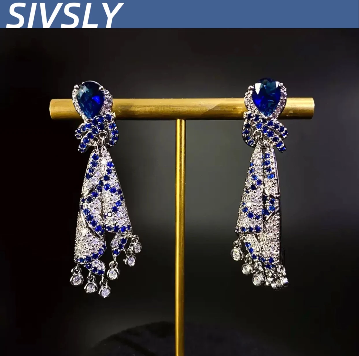 

[Luxury] Heavy-duty colored silk earrings, French high-end feeling temperament, autumn and winter zirconium jewelry, tassel