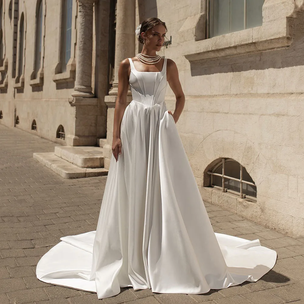

Satin Ivory Wedding Dresses 2025 Vinitage Pockets A-Line Square Neck Corset Bridal Gown Sweep Train Bride Dress Customized