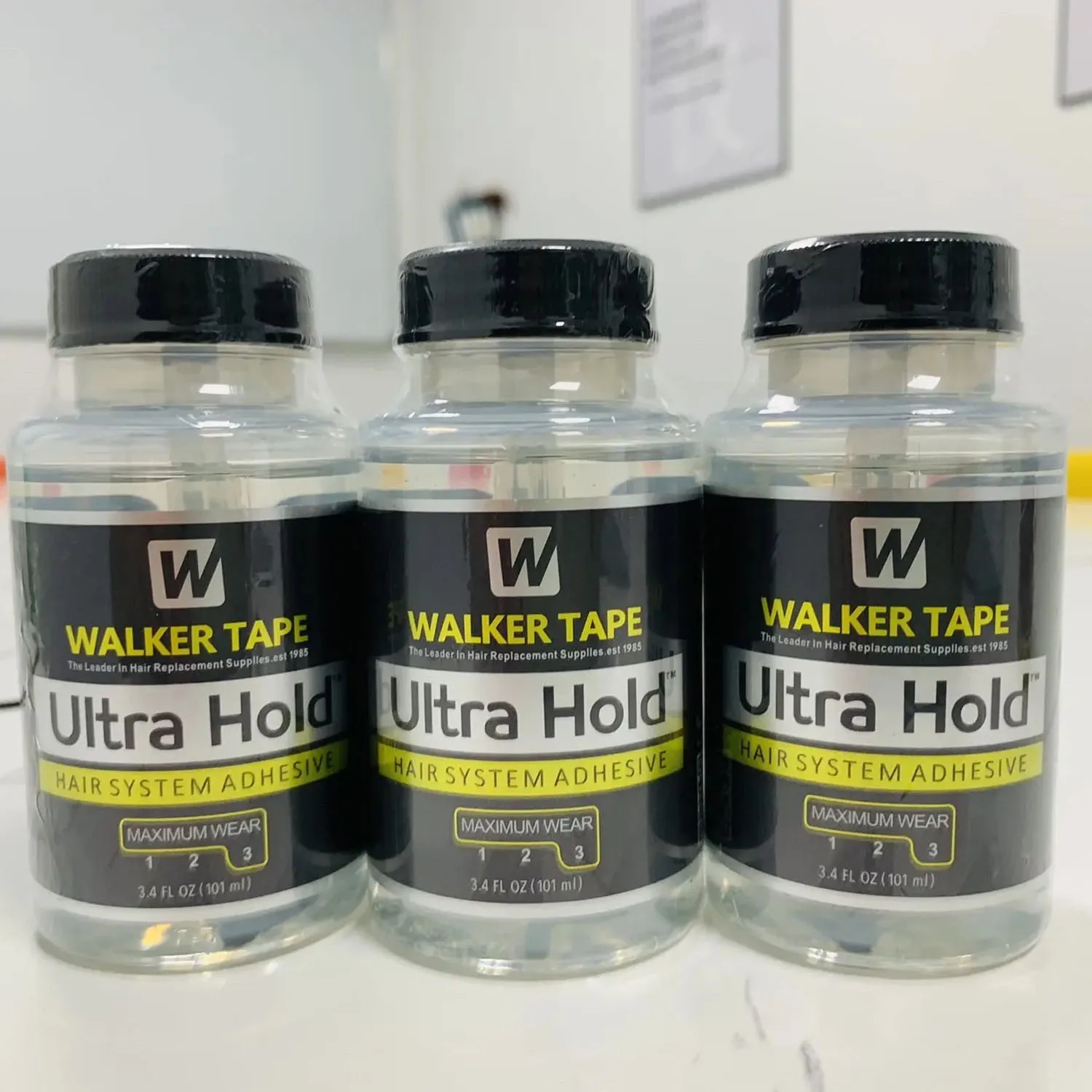 

Оптовая продажа Walker Tape Ultra Hold Lace Wig Glue Водонепроницаемый прозрачный кружевной клей для замены волос Клей-кисть 101 мл