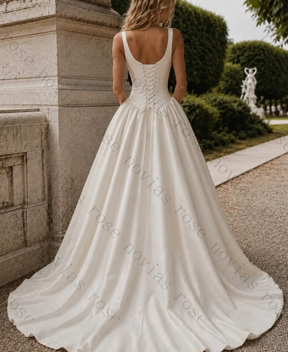 Customized Retro Floral Embroidered Satin Wedding Dress 2026 Sleeveless Low Round Neck A-line Bridal Gown Garden Bohemian Style
