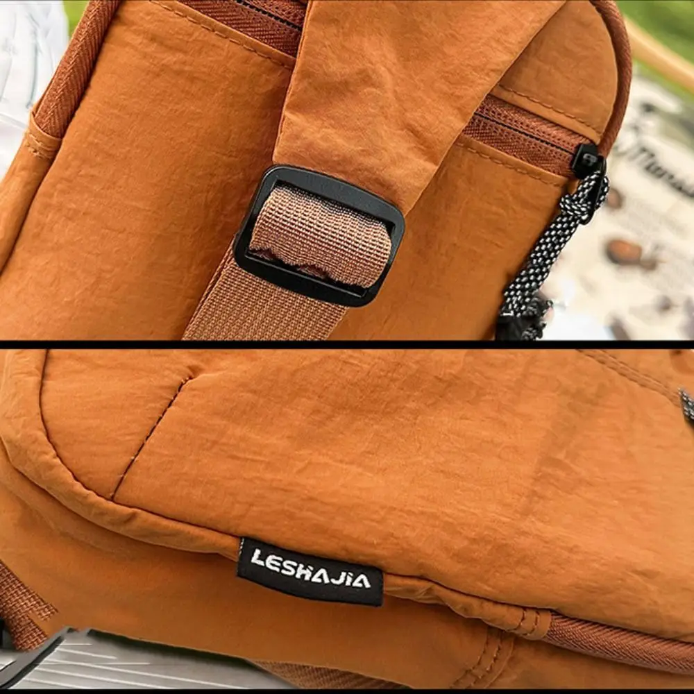 حقيبة كتف نايلون بلون سادة خفيفة الوزن ذات سعة كبيرة حقيبة كروس رياضية على الطراز الكوري حقيبة صدر خارجية متعددة الوظائف