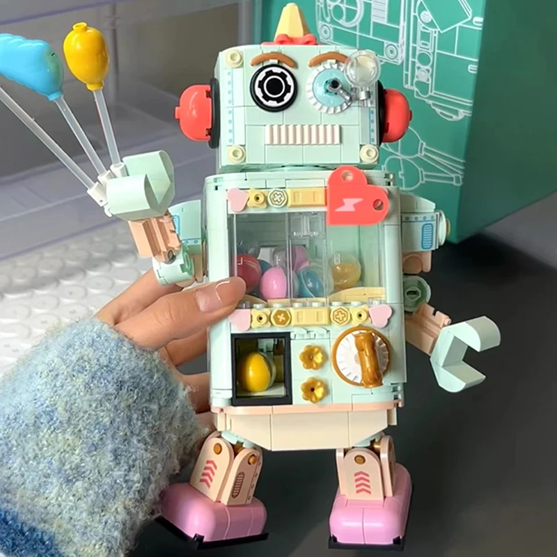 

Строительные блоки JAKI, капсульный робот, поворотный настольный игровой автомат, креативная ручная работа, декоративные фигурки «сделай сам», игрушки, подарки на день рождения