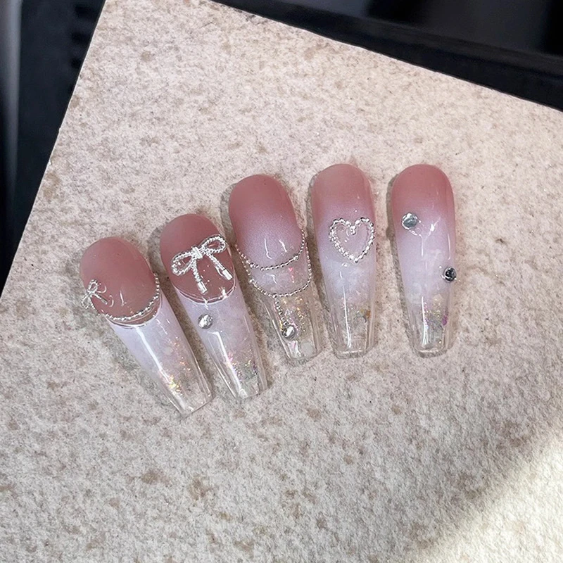 10 pièces alliage nœud papillon amour ongles Art breloques décorations 3D luxe métal argent arcs en forme de bijoux bricolage manucure conceptions fournitures