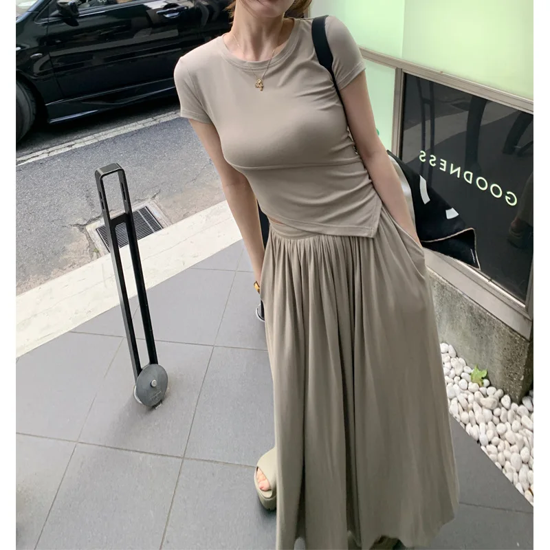 

Suit women's 2024 summer new lazy irregular short-sleeved T-shirt top high waist pleated skirt two-piece suit