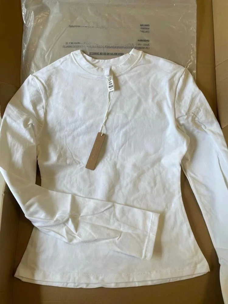 เสื้อยืดคอกลมผ้าฝ้ายคาร์เดียนแท้ทรงเข้ารูป แขนยาว สไตล์ลำลองอเนกประสงค์ เหมาะสำหรับฤดูใบไม้ผลิ แฟชั่นสำหรับผู้หญิง