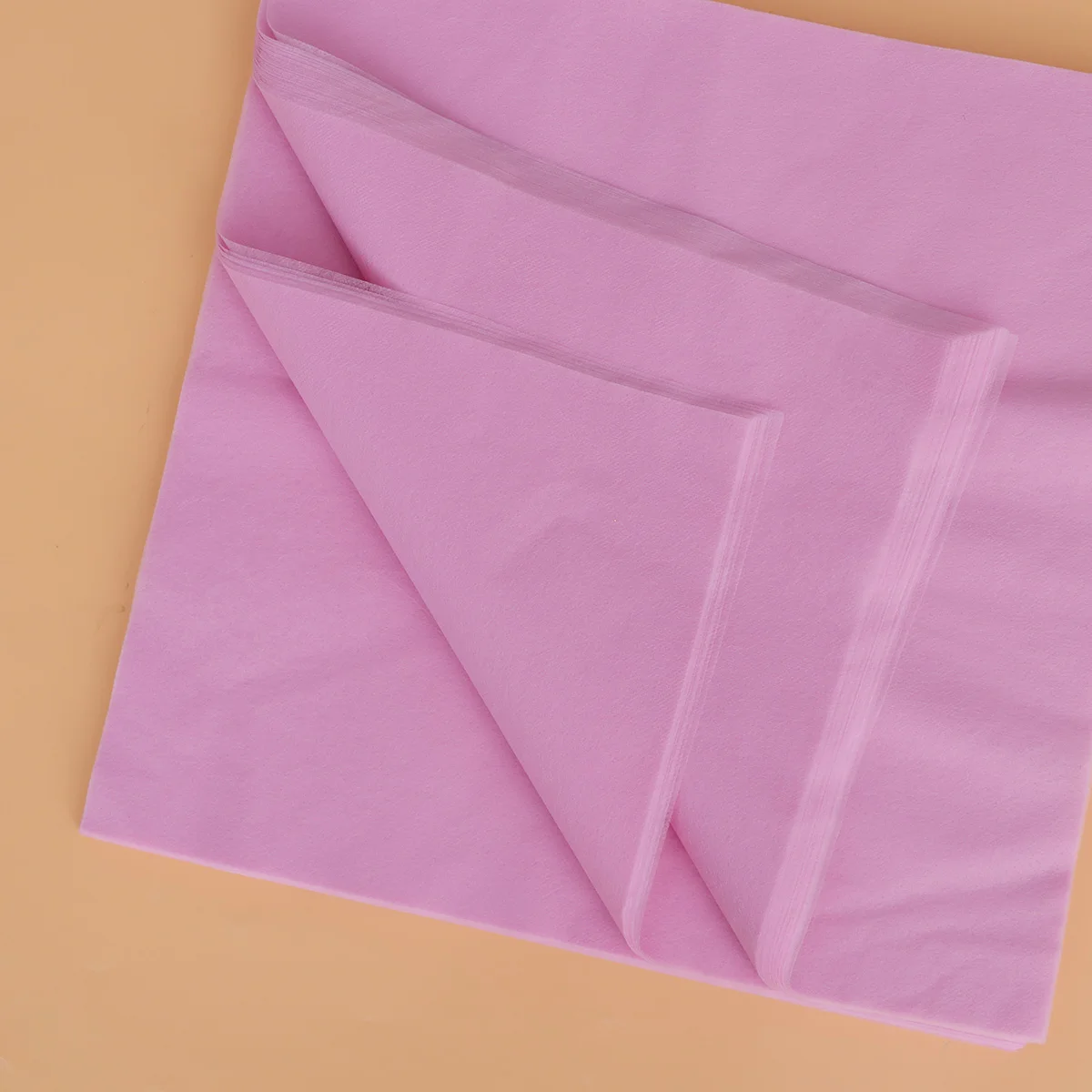 

100pcs Disposable Face Massage Cover Pad Non-Woven Fabric Silica Gel Surface Spa Salon Bed Pillow Cushion For Women Face Hole