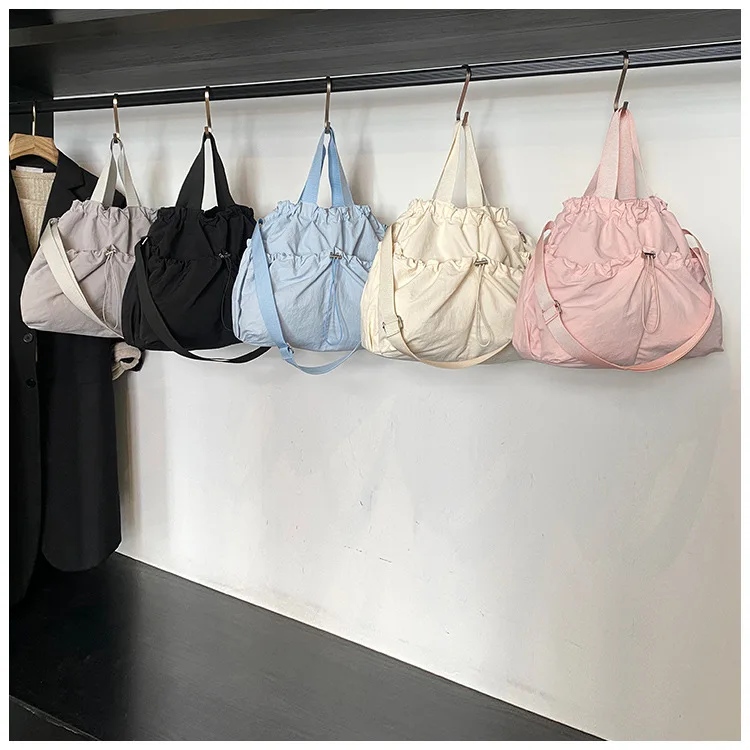 

2025 New Nylon Drawstring Backpack for Women, Spacious Travel Rucksack, Water-Resistant Gym Bag, Versatile & Lightweight​