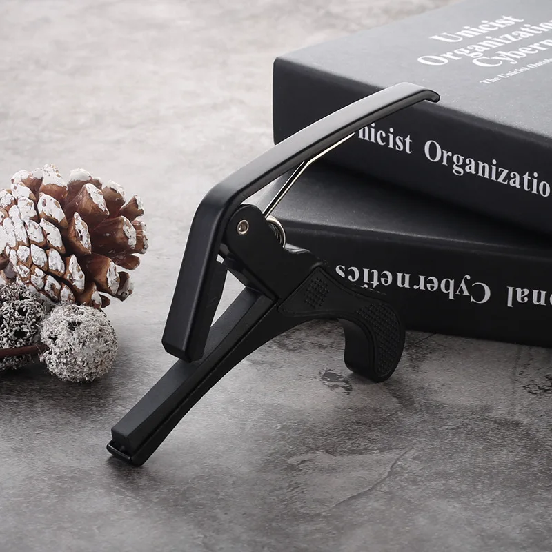 Cejilla de guitarra de metal para guitarra eléctrica acústica con almohadilla de silicona Clip de aluminio de una sola mano