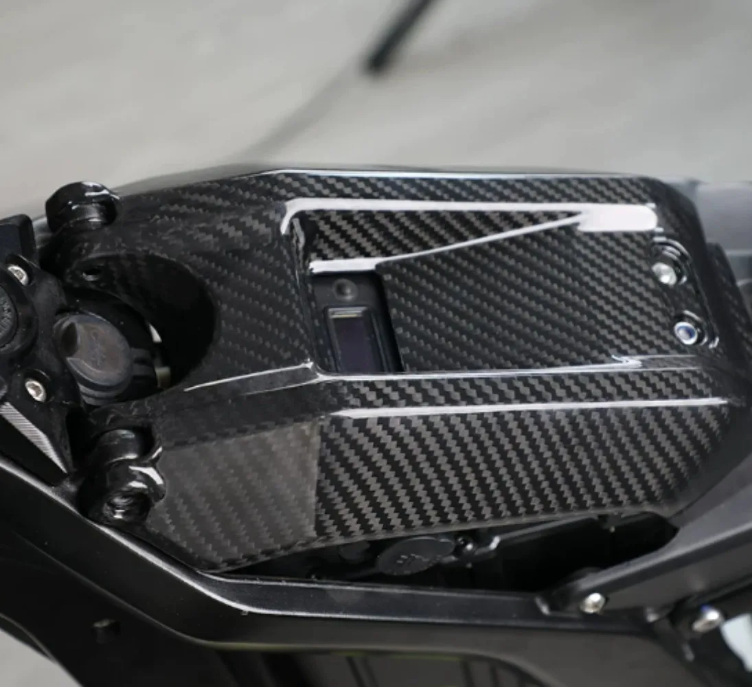 A ventilated battery cover made from carbon fiber material electric Dirt Bike Battery Cover Carbon Fiber Pattern Battery