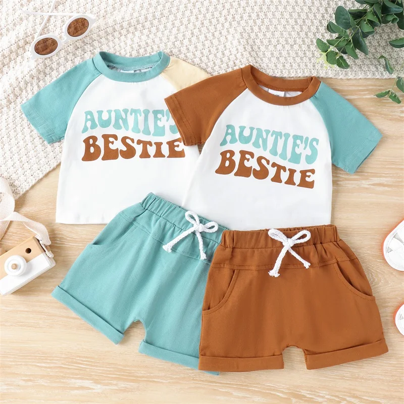 

Lioraitiin Toddler Boys Summer Outfits Letter Print Contrast Color Short Sleeve T-Shirts Tops Elastic Waist Shorts Clothes Set