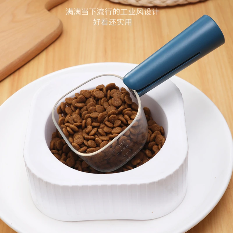 مستلزمات ملعقة شفافة جديدة لأغذية الحيوانات الأليفة مع قياس متدرج لتغذية القطط والكلاب وملعقة مجرفة منتجات الحيوانات الأليفة