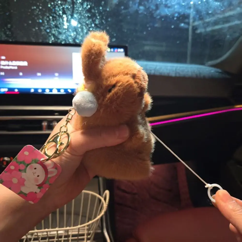 Capybara drôle en peluche pendentif oreilles de lapin mobiles tirer corde dessin animé en peluche jouet porte-clés dessin animé Animal marron