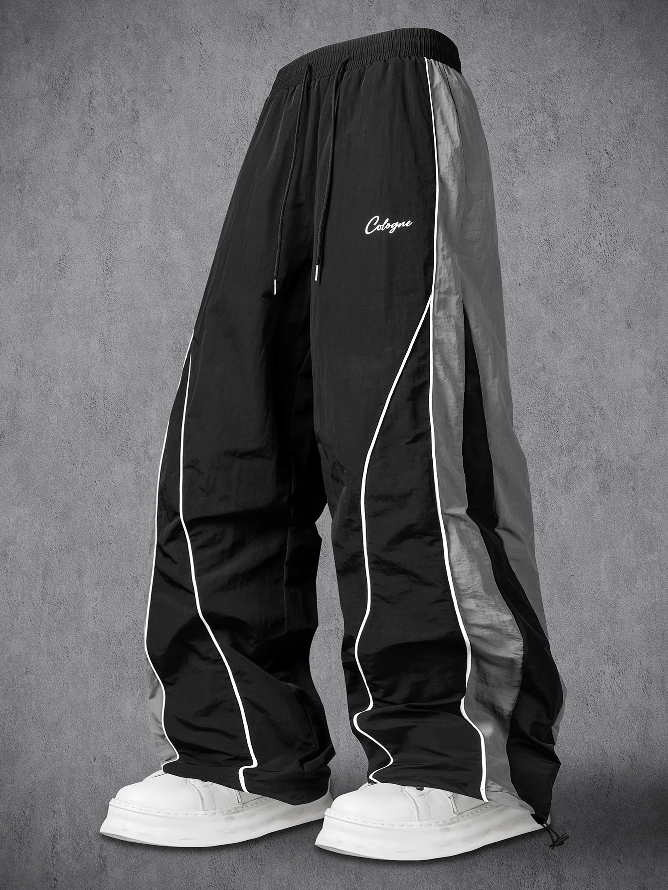Men Color Block Spliced Wide Leg Track Pants, Elastic Drawstring Waist, Side Reflective Lines, Adjustable Drawstring Hem, Small Letter Print, Loose Fit, Hip Hop Streetwear Casual Trousers