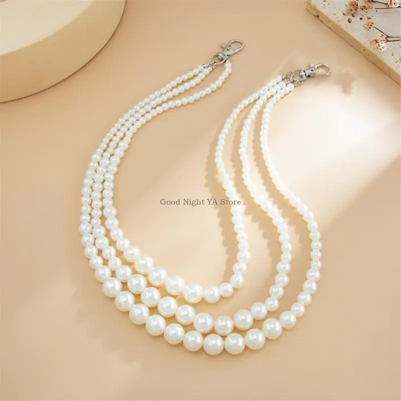 حقيبة يد بسلسلة جانبية من اللؤلؤ على سروال الجينز لراقصات الفتيات في العقد الأول من القرن الحادي والعشرين #4