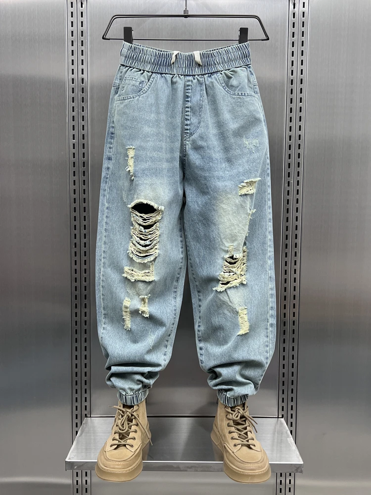 

Trendy Men's Ripped Denim Jeans Spring Autumn Loose Washed Elastic Waist Harem Pants Nine Points Harlan Style Casual Youthful