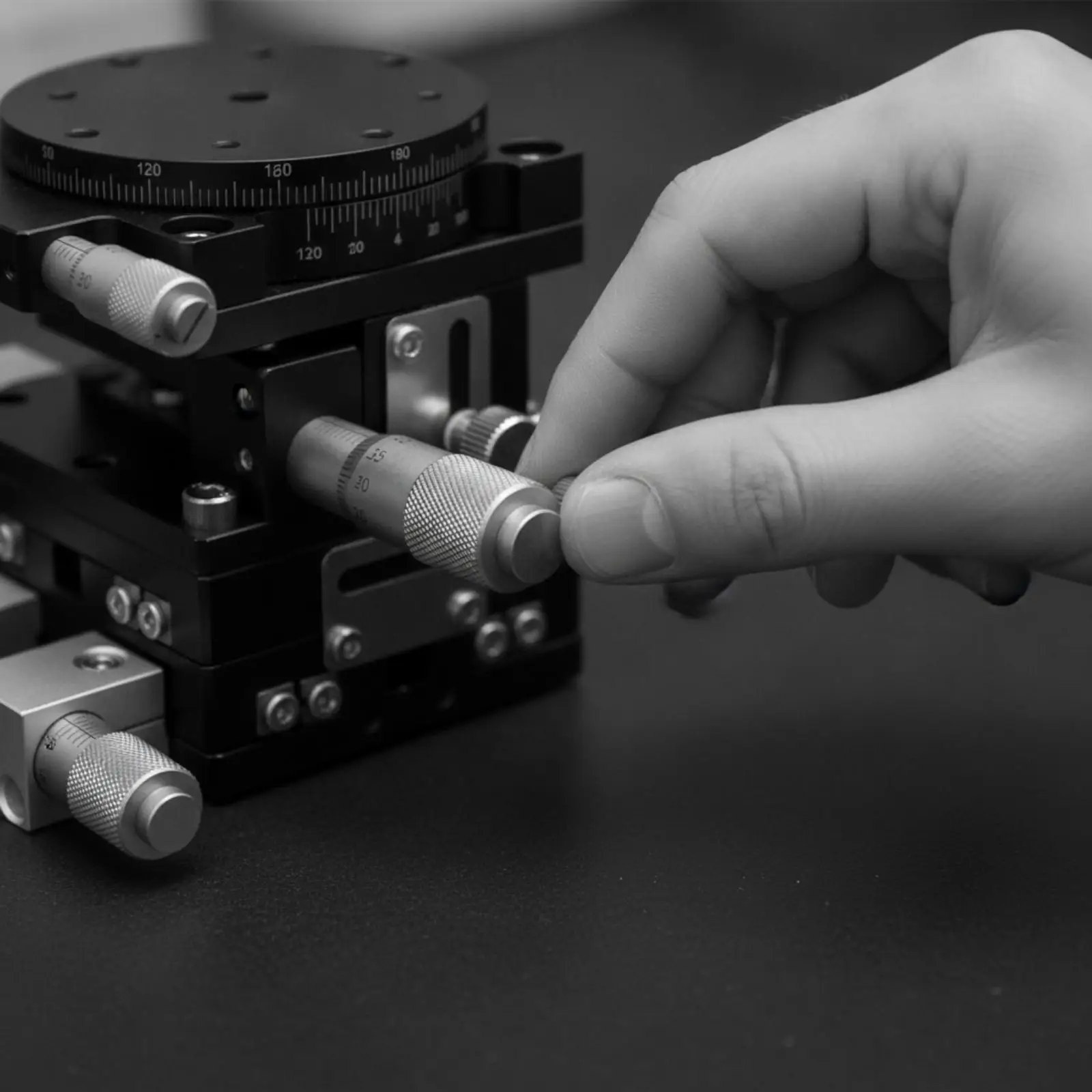 Manual Linear Stage with Black Anodized Base and Knurled Control Knobs for Accurate Calibration in Research Labs
