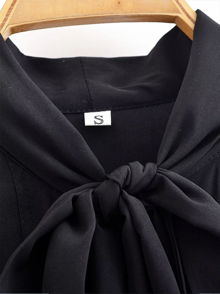 European style new women's fashion versatile elegant solid color long-sleeved shirt with bow detail and round neckline.