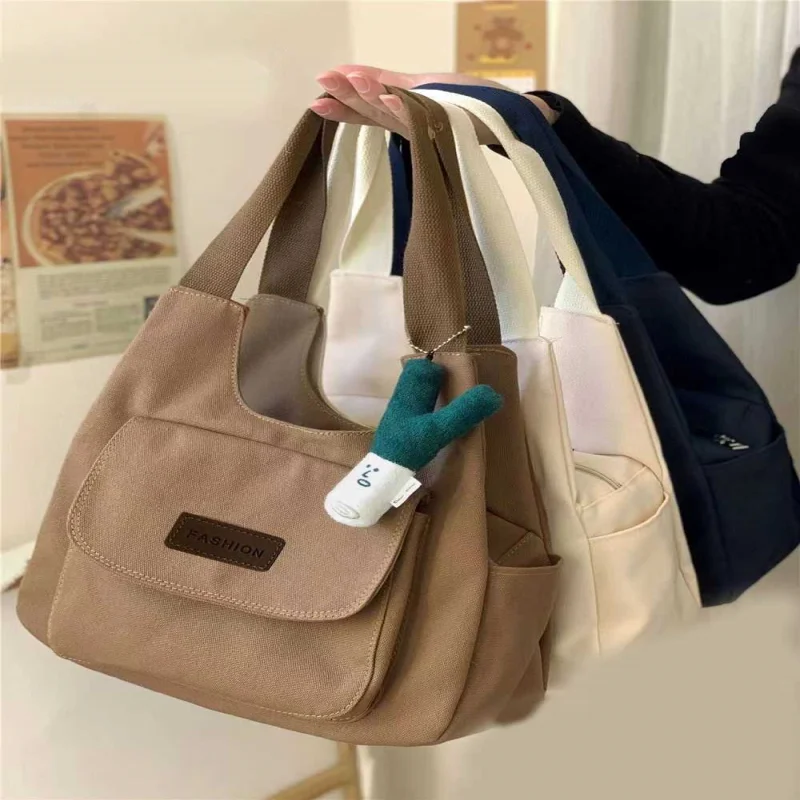 

Retro Japanese Sle Canvas Commuter Bag Women's Casual Color Versatile Tote Bag Simple Design Sensation Handbag
