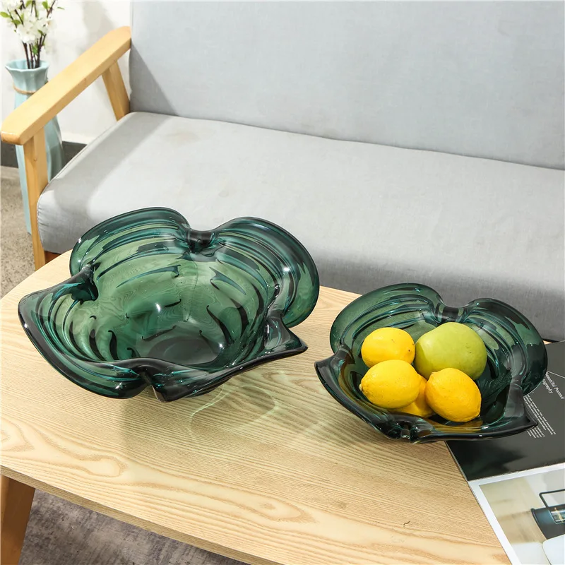 

Home glass fruit plate is simple and light luxury, model room blowing waves special-shaped living room ornaments decorative