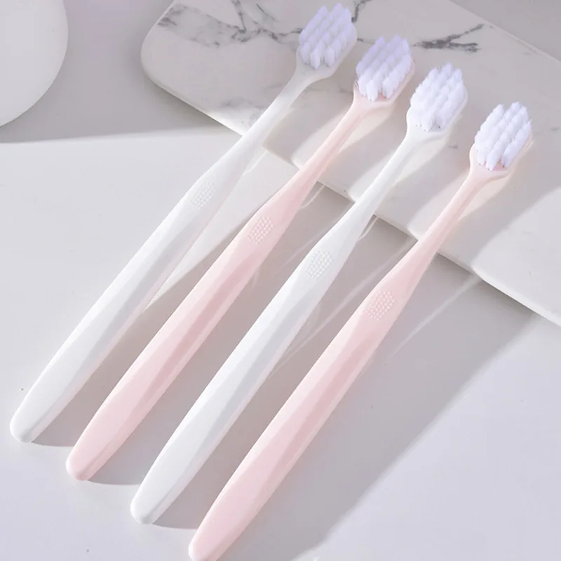 

Hot Selling New Portable Couple Toothbrush Soft Hair Wide Head Individual Packing Ten Thousand Root Feather Soft Silk Oral Care